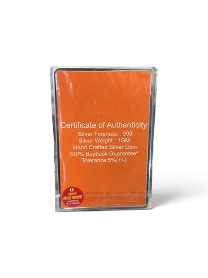 Back of 999 silver gifting coin package showing certificate of authenticity, silver fineness and silver weight details.